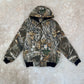 Rework maskáčová bunda Carhartt s černým úpletem (XL)